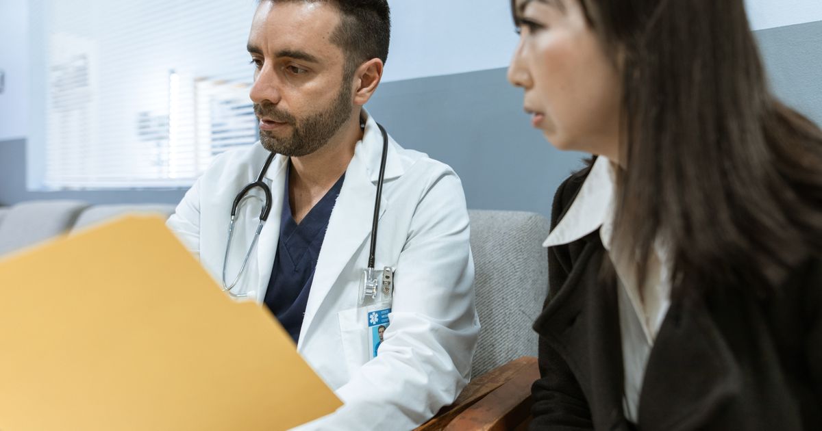 Travel nurse reviewing assignment contract in North Carolina hospital